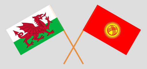 Crossed flags of Wales and Kyrgyzstan. Official colors. Correct proportion