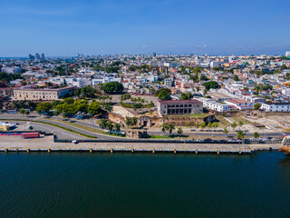 Fototapeta premium Beautiful aerial view of the City of San Domingo, its buildings and Caribbean ocean, in Dominican Republic