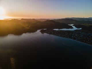 Fototapeta na wymiar Sunrise over Cooks Beach, Coromandel Peninsula - New Zealand