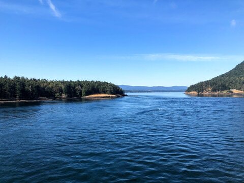 A view of active pass, a common BC Ferries route through the gulf islands, on a beautiful sunny summer day outside of Vancouver, British Columbia, Canada