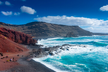 Lanzarote, Spain, 20 March 2022: The Atlantic  Ocean at El Golfo black volcanic beach