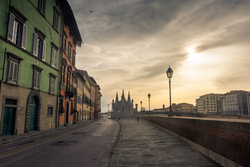 Obraz premium Pisa, Italy, 14 April 2022: Banks of the Arno River