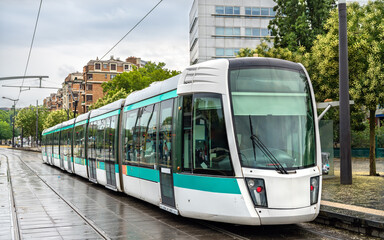 Modern city tram. Public transport in Paris, France - obrazy, fototapety, plakaty