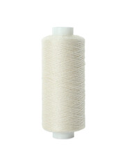 Spool of beige sewing thread isolated on white