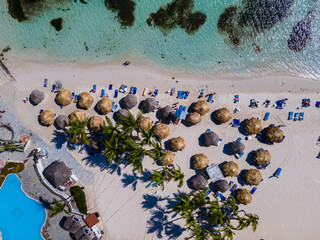 Beautiful aerial view of Boca Chica beach, its turquoise waters, resorts near the Santo Domingo...