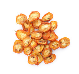 Heap of cut dried kumquat fruits isolated on white, top view