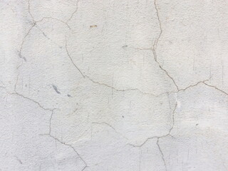 Cracked concrete texture closeup background