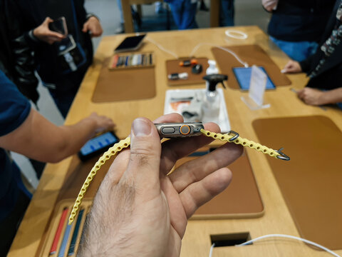 Paris, France - Sep 23, 2022: New Titanium Apple Watch Ultra Designed For Extreme Activities - Man Looking At The New Ocean Band Apple Store First Day Of Sale