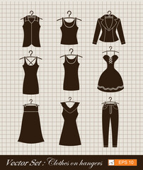 vector set ,Hand drawn clothes on hangers, vector illustration 