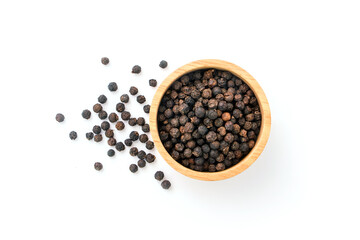 Black pepper or peppercorns in wooden bowl isolated on white background , top view , flat lay.