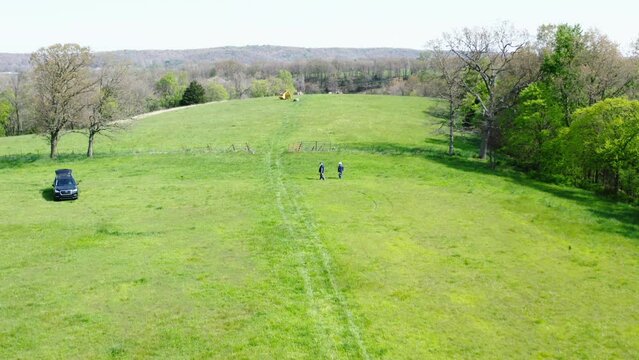 Professional Land Surveyors At Work Measuring Farm Property In Arkansas, USA. aerial