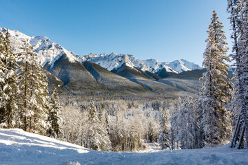 Fototapeta na wymiar Snow covered mountains in winter