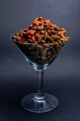 Cat food in a champagne glass.