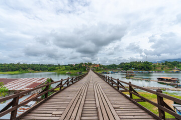 Mon Bridge, wooden bridge over the river In Sangkhlaburi District, Kanchanaburi, natural...