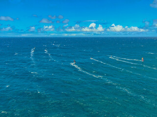 Fototapeta na wymiar Kite surfing along the coast of Maui, Hawaii 2