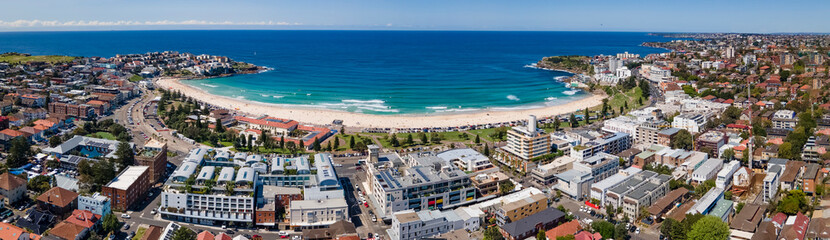 Panoramic aerial drone view of iconic Bondi Beach in Sydney, Australia with the blue ocean in the...