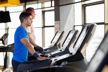 Fototapeta na wymiar Cardio workout in a gym 