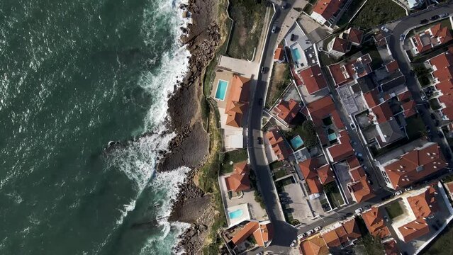 Aerial view of Praia das Macas along south Portuguese coastline facing the Atlantic Ocean, Colares, Portugal.