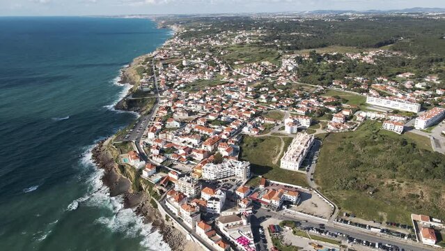 Aerial view of Praia das Macas along south Portuguese coastline facing the Atlantic Ocean, Colares, Portugal.