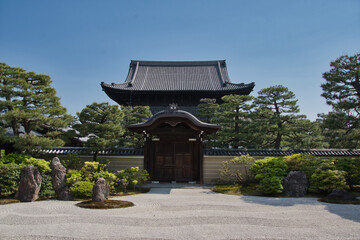 The Zen garden and the main gate inside Kennin-Ji temple.   Kyoto Japan
