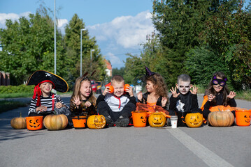 Today's day is full of fun. Happy group of kids on Halloween  