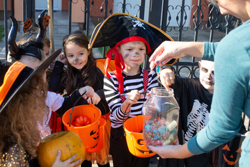 Today's day is full of fun. Happy group of kids on Halloween  