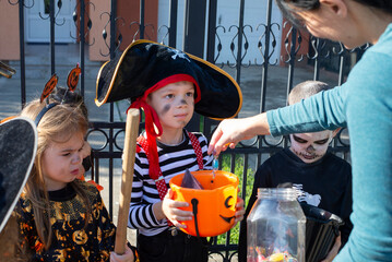 Today's day is full of fun. Happy group of kids on Halloween  