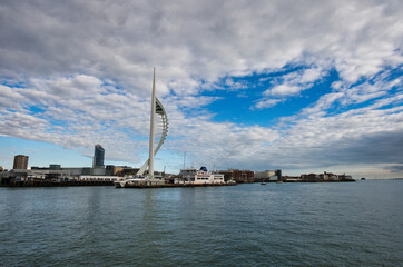 Panorama of Portsmouth with clouds and blue sky from the sea