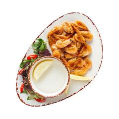 Fried grilled appetizer with lemon and sauce