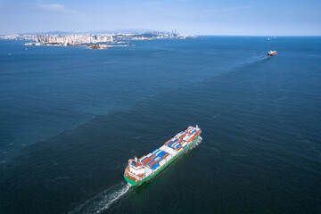 Port terminal freighter and city skyline