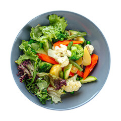 Bowl of steamed vegetables and greens