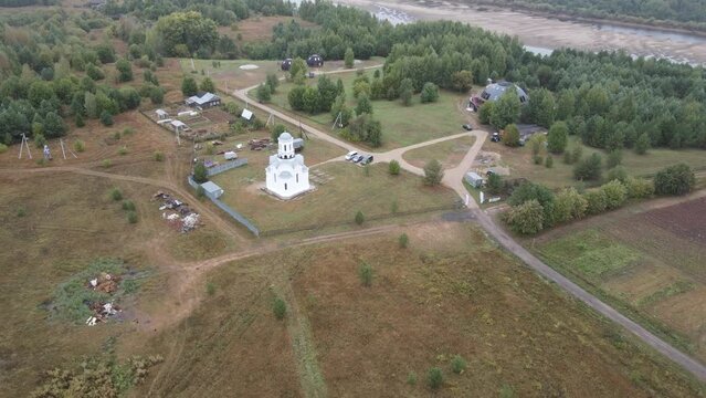 Aerial view oon small church and camp