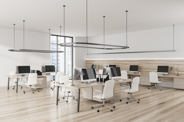 Light business interior with pc computer, desk and panoramic window on city view