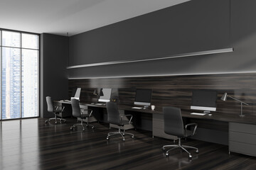 Grey office interior with pc computer, desk and panoramic window on city view