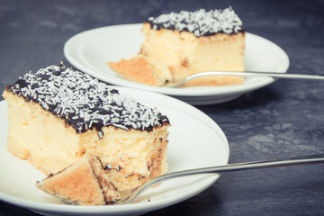 Fresh baked cheesecake on white plate. Delicious dessert