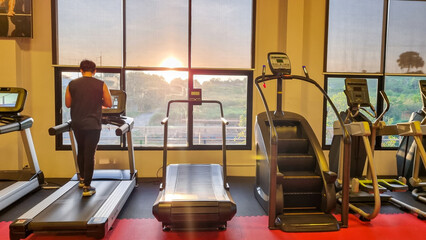 People are excersing in fitness center