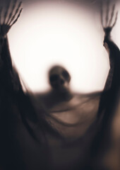 Shadow blur of horror skeleton. Halloween background.
