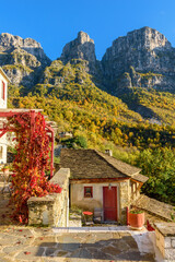 View of the traditional village Mikro Papigo with with the famous stone buildings during fall...