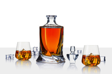 Decanter with cognac. Whiskey decanter on white background. Strong alcoholic drink in a decanter