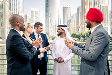 Multiracial corporare business team meeting for a deal in Dubai - Multicultural business people having a business meeting