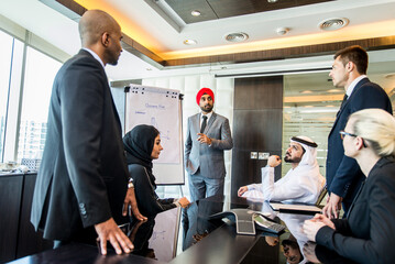 Multiracial corporare business team meeting for a deal in Dubai - Multicultural business people having a business meeting
