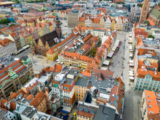 Fototapeta na wymiar WROCLAW, POLAND - 06 SEPTEMBER, 2022: Wroclaw. Aerial View of Old Town of Wroclaw. Colorful Roofs of Historic Market Squere. Wroclaw, Poland. Europe. 