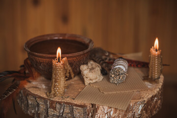 Candle burns on the altar, powerful magic among candles, energy cleaning and wicca concept	