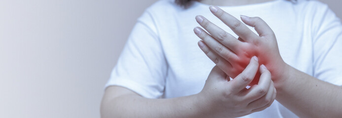 woman scratching the itch on her hands allergic reaction to insect bites, dermatitis, food, drugs....