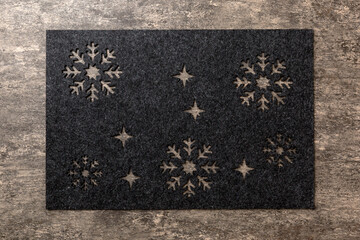 Top view of grey tablecloth for food on cement background. Empty space for your design