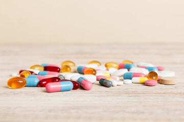 Collection Of Various Medical Tablets And Pills. Assorted pharmaceutical medicine pills, tablets and capsules on table background. Heap of assorted various medicine tablets. Health care