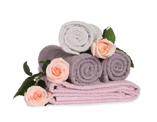 Obraz na płótnie Canvas clean soft towels with flowers isolated on white