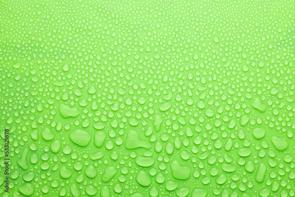 Poster fresh bright water drops on soft light green background as energy nature colorful pattern of differe