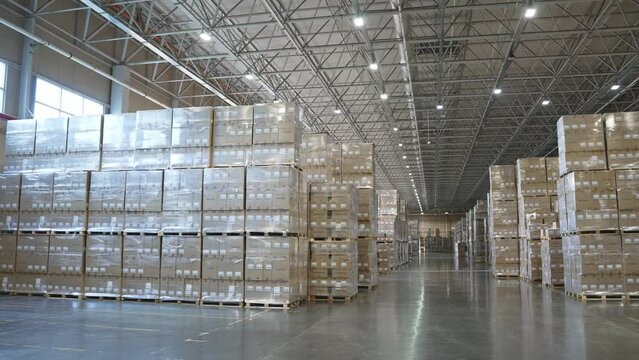Panoramic viwe of bir logistic hub with boxes on shelves
