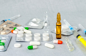 pills and syringe